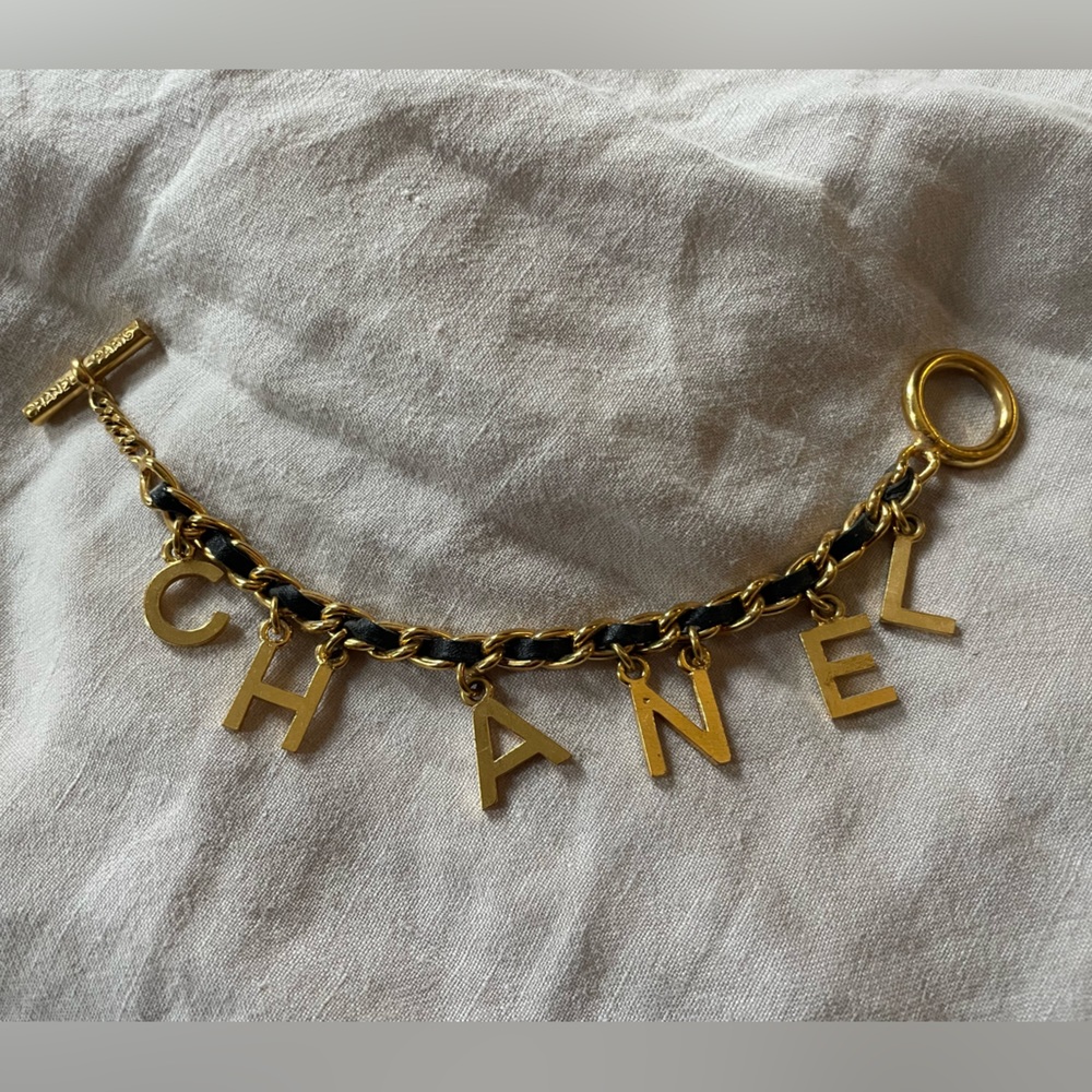 CHANEL Gold and Black Letter Charm Bracelet